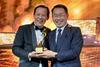 Hactl chief executive Wilson Kwong (right) receives the Air Cargo Terminal Operator of the Year award at the gala dinner