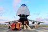 AN-124 being loaded with mining equipment