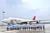 Celebrating in China as One Air's first commercial flight prepares to depart from Jinan-Shandong