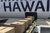 1,600 amenity kits being loaded onto aircraft to be distributed to those displaced by the Maui fires. Photo: Hawaian Airlines