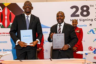 Air Tanzania CEO Peter Ulanga (left) and Kenya Airways Group Managing Director and CEO Allan Kilavuka