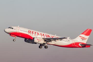 Red Wings Airplane,At,The,Airport.,Preparing,For,The,Flight.,Passenger,Aircraft.