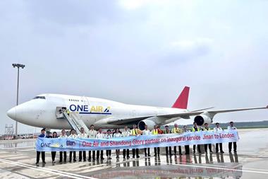 Celebrating in China as One Air's first commercial flight prepares to depart from Jinan-Shandong