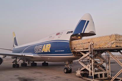 Loading the oversize shipment on the One Air flight