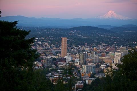 Big Pink and downtown Portland, Oregon with Mount Hood in the distance.