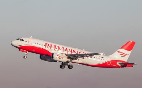 Red Wings Airplane,At,The,Airport.,Preparing,For,The,Flight.,Passenger,Aircraft.