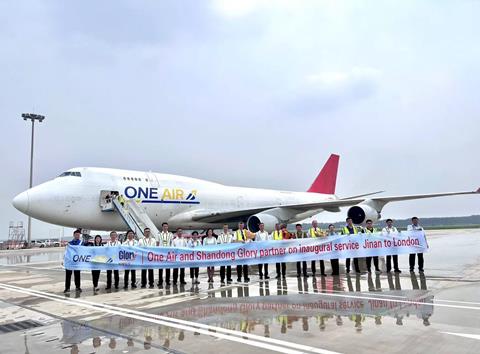 Celebrating in China as One Air's first commercial flight prepares to depart from Jinan-Shandong