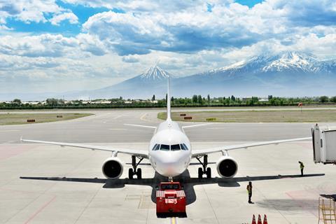 Airplane,Close,To,Gate,Bridge