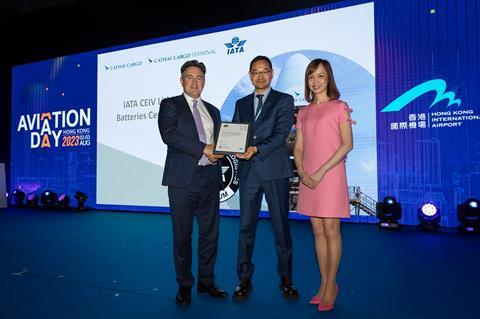 Cathay chief customer and commercial officer Lavinia Lau (right) and director cargo Tom Owen (left) receive the IATA Center of Excellence for Independent Validators Lithium Batteries (CEIV Li-batt) certification from ​ IATA regional vice president Xi...