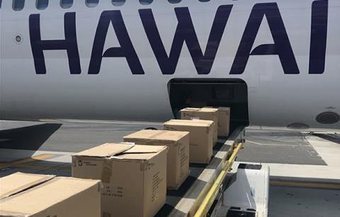 1,600 amenity kits being loaded onto aircraft to be distributed to those displaced by the Maui fires. Photo: Hawaian Airlines