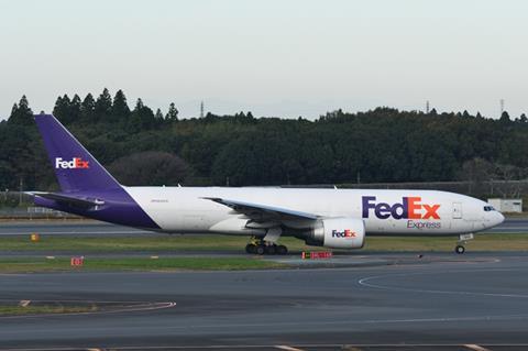 FedEx B777F Chiba, Japan - October 29, 2021:FedEx Boeing B777-FHT (N842FD) freighter.