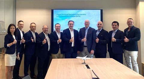 Tom Owen, Cathay's director of cargo (sixth from left) and Michael Simpson, CEO Gateway Services, Americas at WFS (seventh from left)