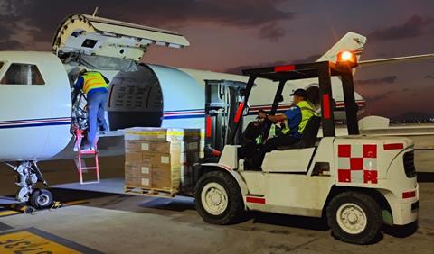 Falcon 20 being loaded with hops