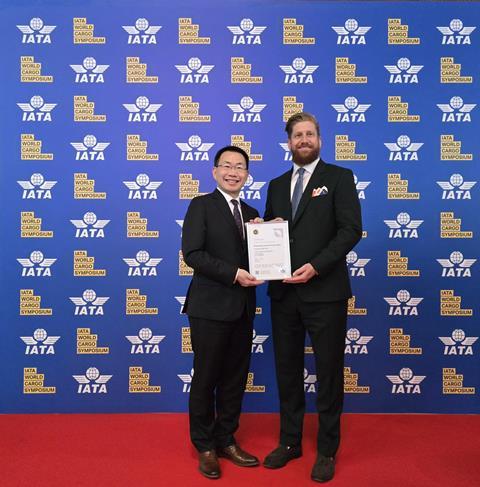IATA Global Head of Cargo, Brendan Sullivan (right) presents the IATA SeMS Certificate to Hactl Chief Executive, Wilson Kwong